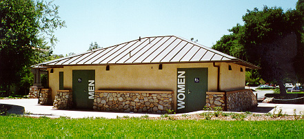 Bathrooms, north of main gate. Some will like them, but some Alumna said hiking up their skirts was a good  Wash ritual.